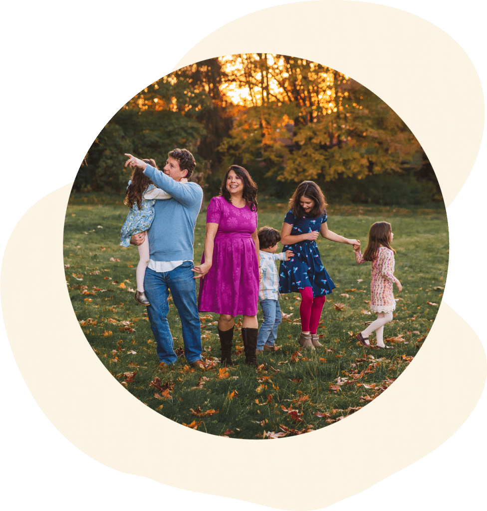 Picture of founders Neil and Rebekah with their four kids in a field expressing the power of appreciation.